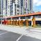 Spacious and Homey 2BR with Extra Room at Meikarta Apartment By Travelio