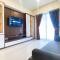 Spacious and Homey 2BR with Extra Room at Meikarta Apartment By Travelio - 芝卡朗