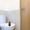 Spacious and Homey 2BR with Extra Room at Meikarta Apartment By Travelio - 芝卡朗