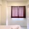 Comfortable 2BR with Working Room at Meikarta Apartment By Travelio