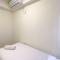 Comfort 2BR with Work Space at Meikarta Apartment By Travelio - 芝卡朗