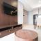 Tidy and Spacious 2BR at Grand Sungkono Lagoon Apartment By Travelio