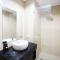 Tidy and Spacious 2BR at Grand Sungkono Lagoon Apartment By Travelio