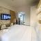 Minimalist and Homey Studio The Alton Apartment By Travelio