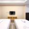 Simply Look Studio at 21st Floor De Prima Apartment By Travelio