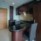 Homey 1BR Apartment at Aryaduta Residence Surabaya By Travelio
