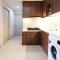 Simple and Clean 2BR at Grand Sungkono Lagoon Apartment By Travelio - 泗水