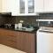 2BR with City and Pool View La Riz Supermall Mansion Apartment By Travelio - Сурабая