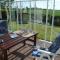 Gemütliches Ferienhaus mit Garten und einer Terrasse mit Windfang