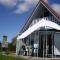 Gemütliches Ferienhaus mit Garten und einer Terrasse mit Windfang
