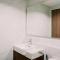 Homey and Comfortable 1BR at The Smith Alam Sutera Apartment By Travelio - 当格浪