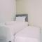 Best Deal and Modern 2BR Amazana Serpong Apartment By Travelio - 当格浪