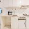 Simply and Nice Studio at Sky House Alam Sutera Apartment By Travelio
