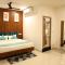 Zing Rooms by GuestHouse Suites