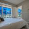 "The Draper" - Luxury Corner Unit w Tower View, - Near Stampede, Saddledome, BMO Centre! FREE Parking, Banff Pass, & Wine!