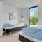 Four-Bedroom Holiday Home With A Fireplace In Juelsminde