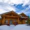 Miles Behind Log Cabin