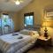 WOW!! Ultimate Pocono Retreat, Hot Tub, Game Room, Deck, Lakes, Skiing, Pools