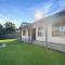 Spacious 4-Bed Home 2-Min to the Beach