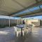 Spacious 4-Bed Home 2-Min to the Beach