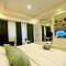 One Bedroom with Balcony by Christine Suites PH in Greenbelt Radisson - Manila