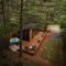 Glamping cottage with glass front and hot tub!