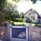 Putsborough Manor 3 Self Catering Cottages with Beach a short walk, dog friendly all year, On site Tennis, Play Area, Paddock, Spa baths, BBQ, Private Gardens, Superfast WIFI