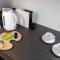 ALURE RESIDENCES 10 - 24h self check-in & private parking next to the apartment building included, CITY CENTER right on SNP Square in a quiet passage, new building, best deal in town - Banská Bystrica