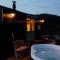 Black hut at Slieve Croob Glamping - Ballyward