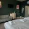 Nomi Rooms & Restaurant