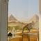 Pyramids Land Suites - 开罗