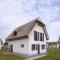 Reetland am Meer - Luxus Reetdachvilla mit 3 Schlafzimmern, Sauna und Kamin G05