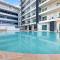 High-Rise Modern Oasis with Pool and City Views