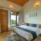 StayVista at The Woods with Indoor Fireplace & BBQ