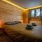 Pétillant Chalet aux 3 étangs avec SPA, Sauna et Véranda