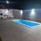 Nossa Casa com Piscina - غواراباري