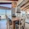 Beachfront Deck with steps down to the white sandy beach Sea Dunes Sandcastle 1A