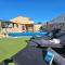 Villa Izziy by the beach with a sea view and heated pool - Ražanac