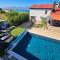 Villa Izziy by the beach with a sea view and heated pool - Ražanac