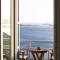 Grand Blue Balcony- Island House by Hostandros
