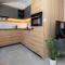 ALURE RESIDENCES 11 - 24h self check-in & private parking next to the apartment building included, CITY CENTER right on SNP Square in a quiet passage, new building, best deal in town - Banská Bystrica