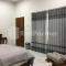Hotel D88 Mitra RedDoorz Near Santera Flower Garden