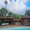 Bungalow confortable à Ruisseau avec piscine partagée - Le Ruisseau