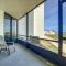 Beachfront with a pool at Ocean Trillium Condo ~ 101
