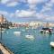 A beautiful 2BR seafront home with private terrace by 360 Estates - Il-Gżira