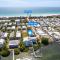 On The Rocks, 8 bed, 8,5 bath, Waterfront home with boat dock and rooftop deck - برادنتون بيتش