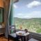 SaffronStays Ridgeview Manor, Mukteshwar - 3BHK Villa with Himalayan Views & Verandahs
