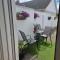 The middle of everywhere - 2 bedrooms option of making a third - One large 2 double beds One medium with One Double bed, option of adding a double bed to the Sitting Room as required - Waterford
