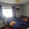 The middle of everywhere - 2 bedrooms option of making a third - One large 2 double beds One medium with One Double bed, option of adding a double bed to the Sitting Room as required - Waterford