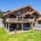 Chalet Emeraude, chalet de luxe avec vue montagne Chalet Emeraude, chalet de luxe avec vue montagne